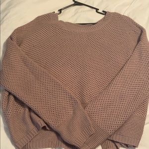 Cropped sweater with open back